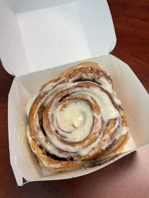 Single regular-sized cinnamon roll. Taste it with your eyes lol. Warm & sticky-sweet, gooey soft. $6+ - way overpriced...but delish.