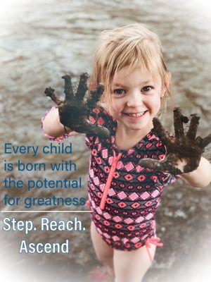 Child playing with mud.