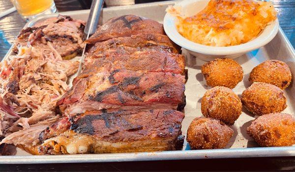 Pulled pork, brisket, Tennessee ribs, hush puppies and hash brown casserole