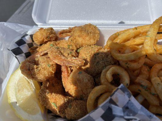 Shrimp, curly fries and catfish