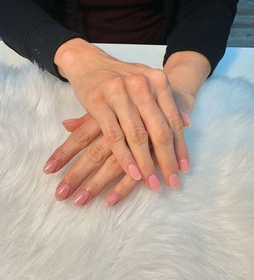 "Short, natural Gel-X nails with a classic, timeless finish."