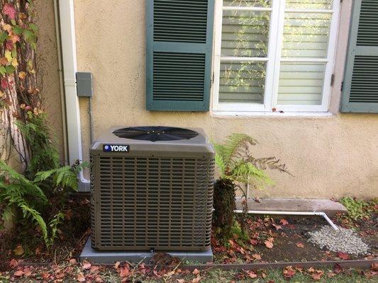 The condenser, which cools the refrigerant for the AC, is often placed in the backyard or side yard.