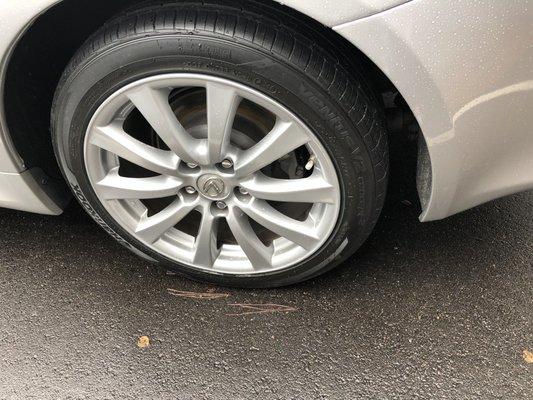 Driver rear bumper and rim repair by Johnson Auto Body