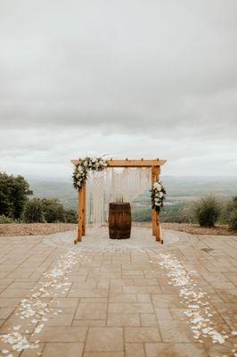 Gorgeous arch pieces and aisle petals done by ATOE (macrame from seller on Etsy - WallKnot)