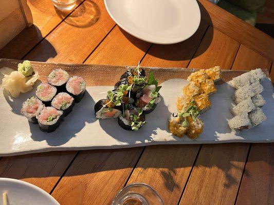 From left to right: arjun toro maki, chirashi maki, spicy tuna maki (8 pcs), and california maki (8 pcs)