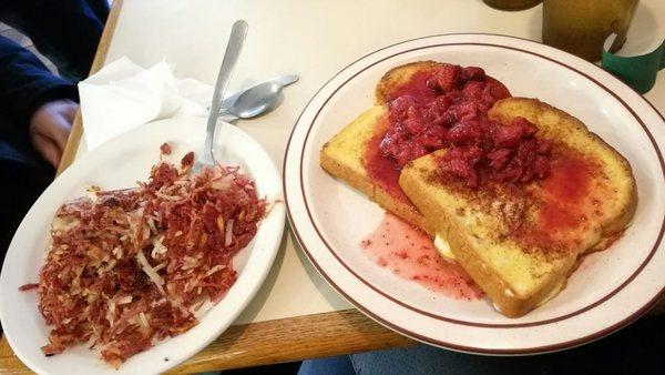 Strawberry French toast and a large order of homemade corned beef hash! Yummy!