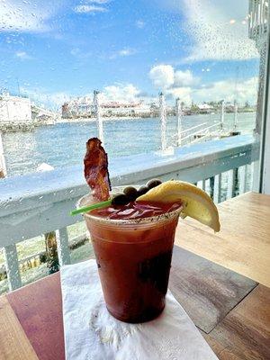 Bloody Mary with bacon and olives, lemonade lime