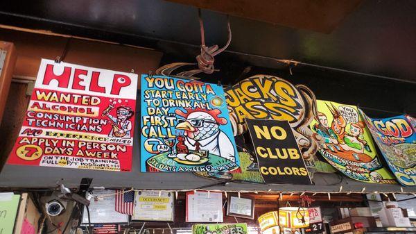 Fun signs above the bar.