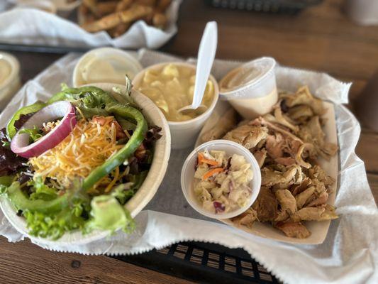 Smoked pulled chicken dinner with side salad and Mac n cheese