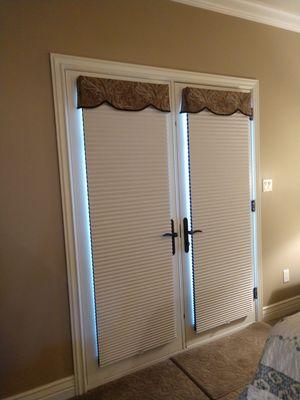 Honeycomb shades on door