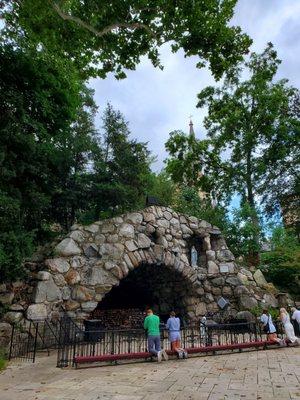 Grotto is in the shadow of the basilica.