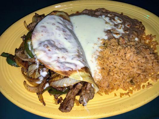 Steak quesadilla with rice and beans