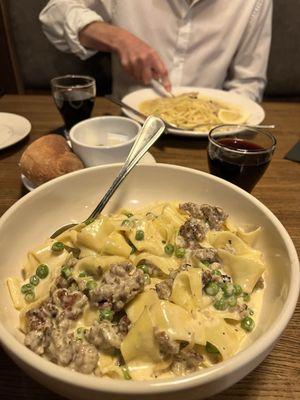 Sausage and pea pappardelle and veal Francese accompanied with Chianti wine