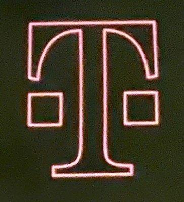 This is one of the many logos for T-Mobile,  found on the business card for a T-Mobile Expert!