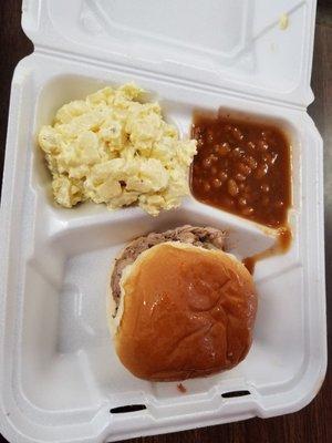 Pork sandwich plate w baked beans and potato salad