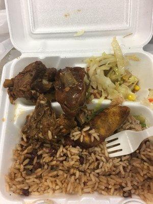 Brown stew Chicken, rice and peas, cabbage and plantains, under $6.