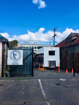 Their Fruitvale Ave lot - look for the lot to the right of Ruby Q/ Aloha Club across the train tracks