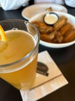 Blue Moon (on tap) and chicken wings.