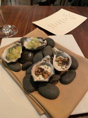 One of a few off-menu items. Cooked oysters on the right and raw oysters on the left.