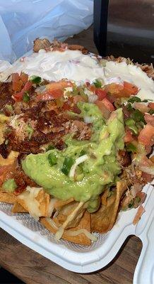 The best chicken super nachos you will ever have !