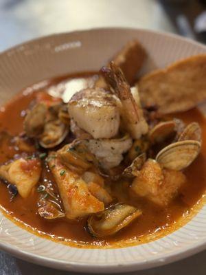 Ciopinno - Octopus, Scallops, Mussels, Clams, Cod & Wild Shrimp in a Spicy Broth with Garlic Bread