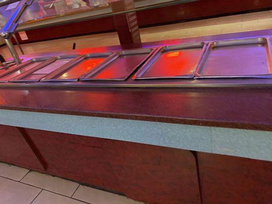 A bar full of stainless plates, delicious.