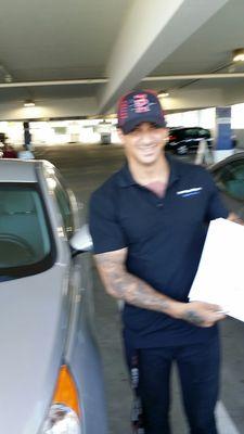 Nikko delivering my second car with a smile.