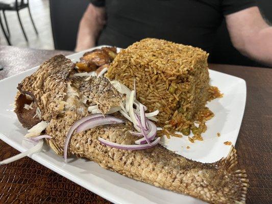 Jollof Rice & Fried Fish( Fried Plaintain & Coleslaw) ( Large) - fish was cooked to perfection.