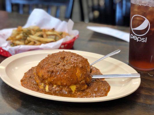 Cheeseburger with chili and Spanish fries