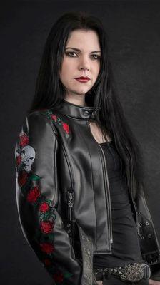 Mia Coldheart- Crucified Barbara in Svanlund Design jacket with embroidered roses and skulls.