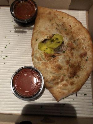 Calzone.  Dipping sauce is pretty bleh, served refrigerator cold