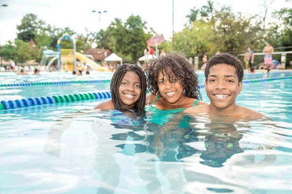 Photo of family enjoying the pool