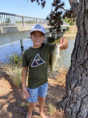 My son caught a bass fish at San Marcos lake