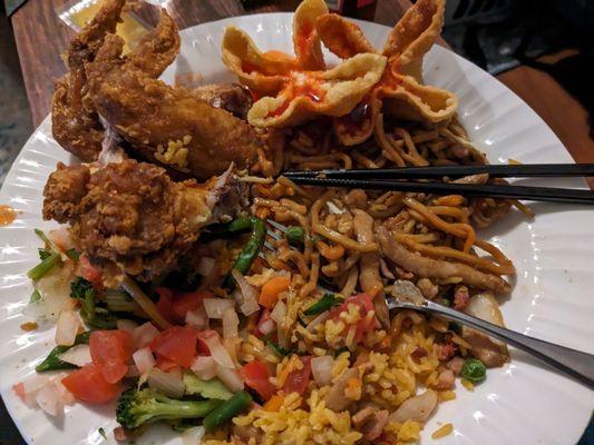 Fried chicken wings, chicken lomein, crab Rangoon, (and the veggies are mine that I made at home lol)