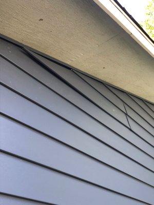 Siding popped loose.