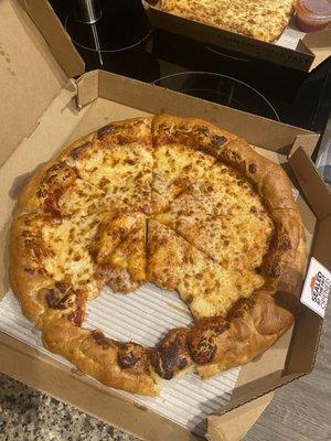 How the cheese stuffed crust looked as soon as I opened it. I've had bad pizza but Never have a received a pizza like this.