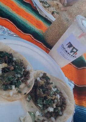 Asada tacos and horchata drinks