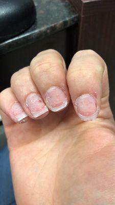 The state of my nails when she was ready to start applying the dip color.