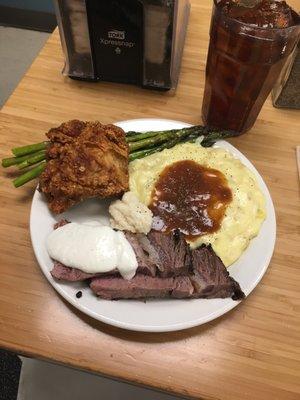 Prime Rib, asparagus, mashed potatoes with gravy, and a piece of fried chicken to boot!!