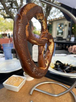 Hot yummy giant pretzel with beer cheese & mustard dipping sauces