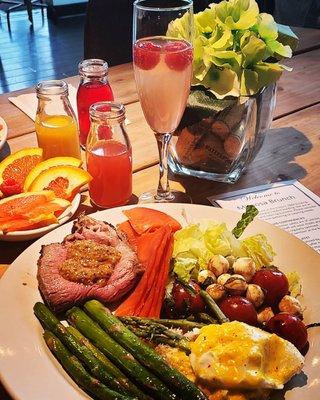 New York strip, smoke salmon, crab Benedict, caprese salad, & mimosas