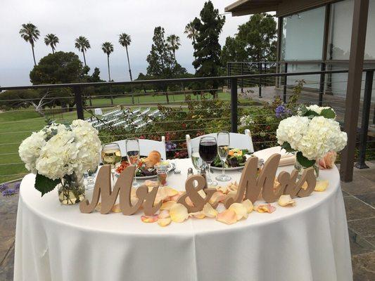 White Hydrangeas and the petals from the Mother of Pearl Roses