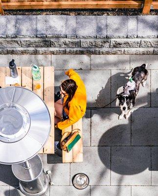 Large outdoor patio with plenty of spaces out seating for small and large groups.