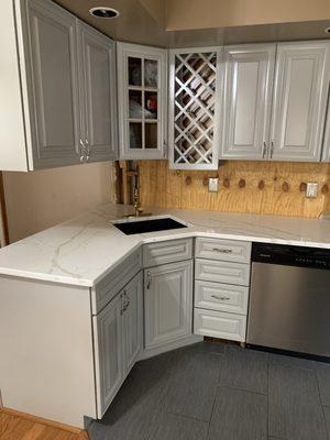 After the countertops were installed and the cabinets were painted