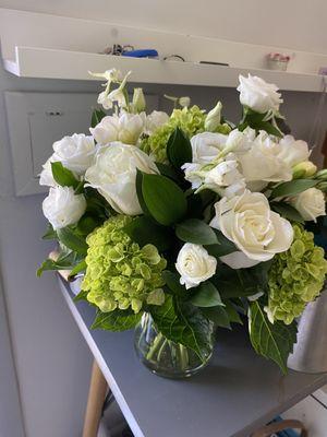 A beautiful white and green arrangement