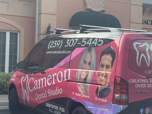 Look-  how cute is their new vehicle, parked outside their office location !  LOVE.