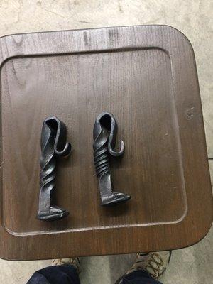 Pair of railroad spike bottle openers