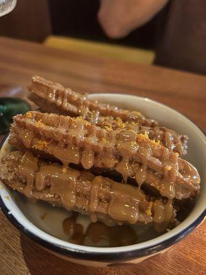 Coconut Milk Churros with Homemade Dulce de Leche Sauce and Orange Zest