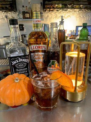 Daily and Seasonal cocktail specials.  Showing Halloween Jack O Lantern