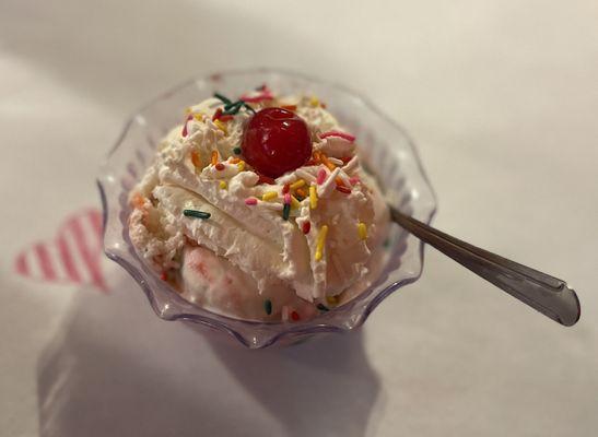 Peppermint ice cream with whipped cream, sprinkles and a cherry for $2.49 - wow!